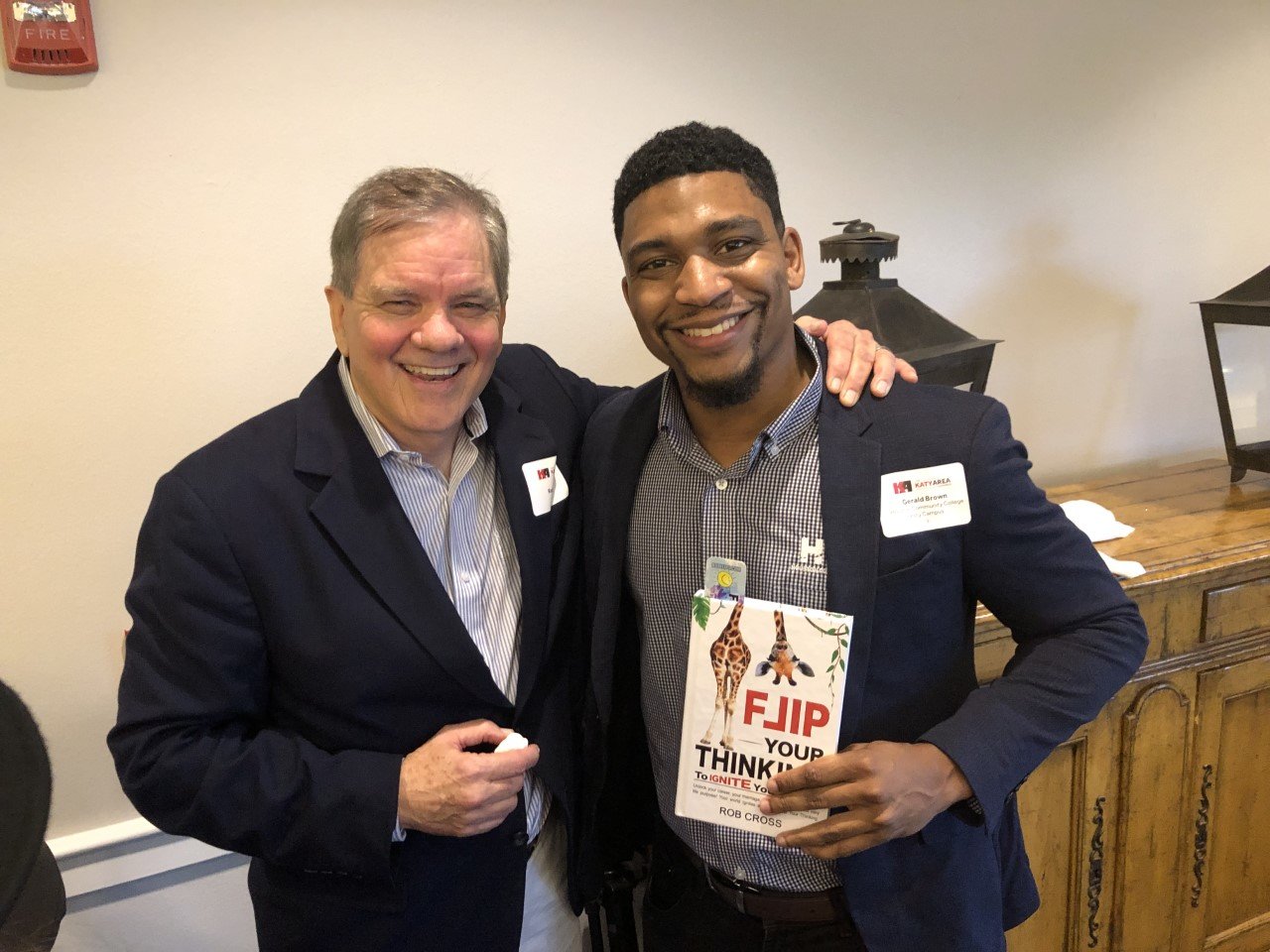 Rob Cross, left, was the featured speaker at the Dec. 8 Katy Area Chamber of Commerce luncheon at Brookwood Community, 1752 FM 1489 in Brookshire. Cross is also an author and sold copies of his book, Flip Your Thinking. Here Cross poses with Gerald Brown of Houston Community College.